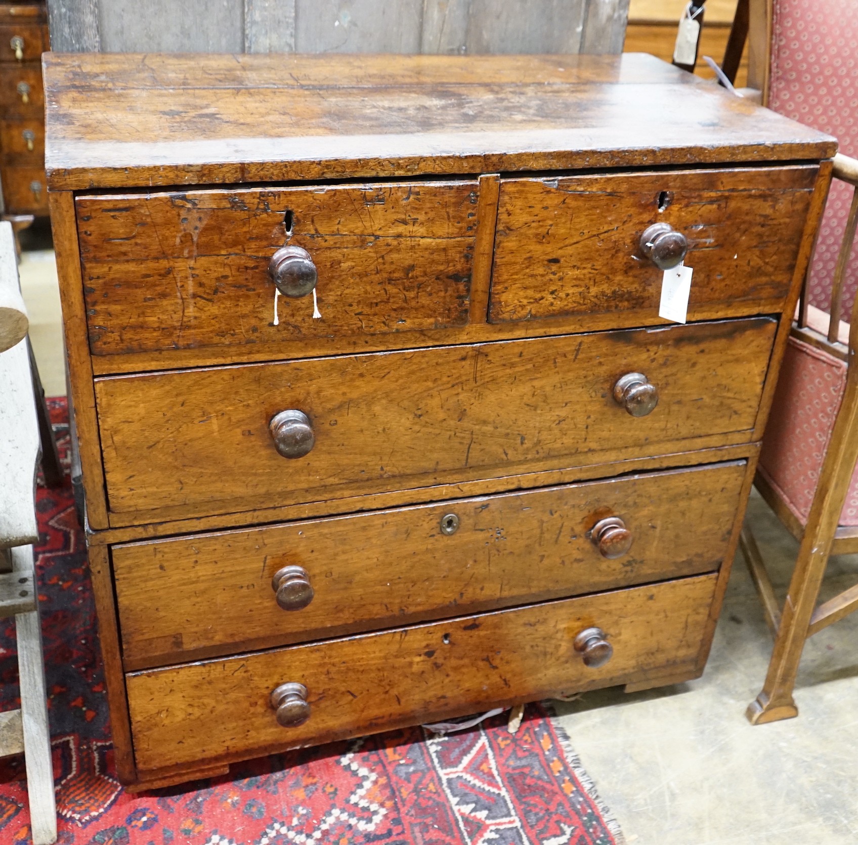 A 19th century mahogany two part chest with later turned wood handles, width 90cm, depth 49cm, height 92cm